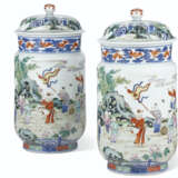 A VERY RARE PAIR OF FAMILLE ROSE 'BOYS' JARS AND COVERS - фото 1