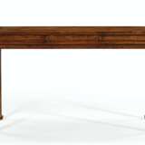 A HUANGHUALI THREE-DRAWER CORNER-LEG DESK, SHUZHUO - photo 1