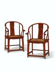 A PAIR OF HUANGHUALI HORSESHOE-BACK ARMCHAIRS, QUANYI