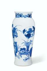 A FINELY DECORATED BLUE AND WHITE BALUSTER VASE