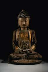 A RARE DRY LACQUER FIGURE OF A SEATED BUDDHA