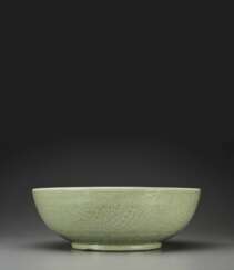 A VERY RARE LARGE LONGQUAN CELADON CARVED BOWL