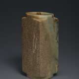 A LARGE GREY AND MOTTLED BROWN JADE CONG - photo 1