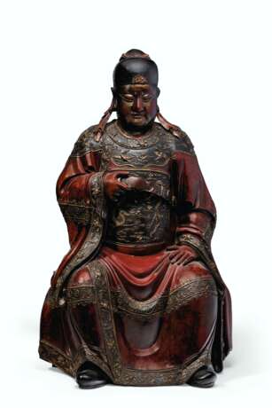 A LARGE CARVED AND LACQUERED WOOD FIGURE OF A SEATED OFFICIA... - photo 1