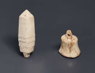 TWO OPAQUE IVORY-COLORED JADE PENDANTS
