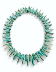 A STRING OF TURQUOISE BEADS