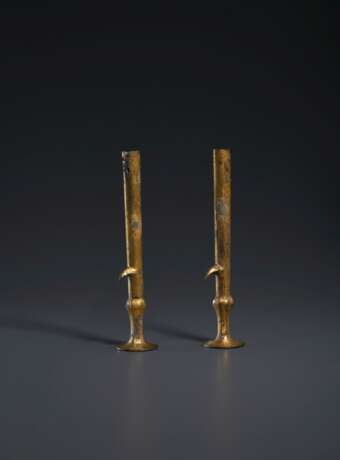 A PAIR OF GILT-BRONZE STAFF ENDS - фото 1