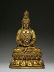 A VERY RARE GILT-BRONZE FIGURE OF SEATED GUANYIN