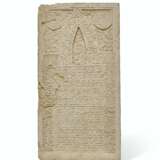 A CARVED WHITE LIMESTONE TOMBSTONE - фото 1