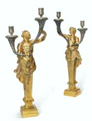 A PAIR OF ITALIAN GILT-BRONZE AND SILVERED-METAL TWIN-LIGHT ...