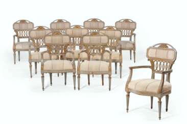 A SET OF TEN ITALIAN GREY-PAINTED AND PARCEL-GILT ARMCHAIRS ...