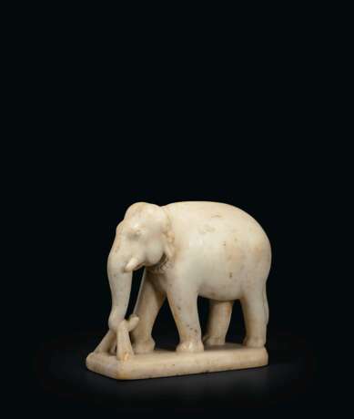 A WHITE MARBLE FIGURE OF AN ELEPHANT - photo 1