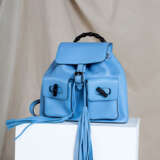 MARIAN KEYES'S LIGHT BLUE LEATHER BACKPACK WITH BAMBOO HANDLE AND TASSELS - фото 1