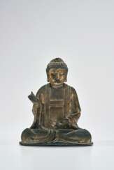 A PERCEL-GILT BRONZE SEATED FIGURE OF BUDDHA AMITABHA