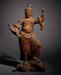 A CARVED WOOD FIGURE OF GUARDIAN KING