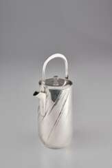 A SILVER EWER AND COVER