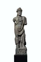 A LARGE AND IMPORTANT GRAY SCHIST FIGURE OF A BODHISATTVA