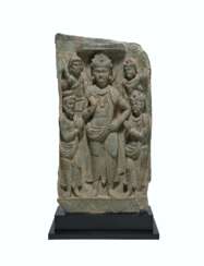 A RARE GREEN SCHIST RELIEF OF SIDDHARTHA WITH ADORANTS