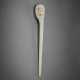 A PALE GREENISH-WHITE JADE RETICULATED HAIR PIN - photo 1