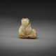 A YELLOW AND RUSSET JADE CARVING OF A BOY AND LOTUS - photo 1