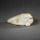 A RARE AND FINELY CARVED PALE GREENISH-WHITE AND RUSSET JADE `BIRD AND PEACH` GROUP - Foto 1