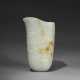 A SUPERB AND FINELY CARVED ARCHAISTIC WHITE JADE RHYTON - photo 1