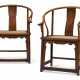 A RARE PAIR OF HUANGHUALI HORSESHOE-BACK ARMCHAIRS - photo 1