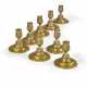 A SET OF EIGHT FRENCH ORMOLU CANDLESTICKS - фото 1