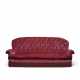 A CRIMSON VELVET UPHOLSTERED THREE-SEATER SOFA - photo 1