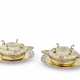 A PAIR OF GERMAN SILVER-GILT ECUELLES, COVERS AND STANDS - Foto 1