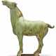 A SMALL GREEN-GLAZED POTTERY FIGURE OF A HORSE - фото 1