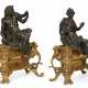 A PAIR OF FRENCH ORMOLU AND PATINATED BRONZE CHENETS - Foto 1