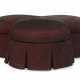 A CONTEMPORARY UPHOLSTERED POUF - Foto 1