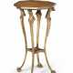 A REGENCY AMBOYNA AND PARCEL-GILT CENTER TABLE - Foto 1