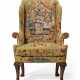 A GEORGE I WALNUT AND NEEDLEWORK WING ARMCHAIR - Foto 1