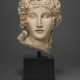 A ROMAN MARBLE HEAD OF THE EROS OF CENTOCELLE - фото 1