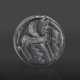 A GREEK BLACK SERPENTINE DOUBLE-SIDED DISK WITH A CENTAUR AND A WINGED HORSE - Foto 1