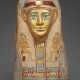 AN EGYPTIAN GILT CARTONNAGE MUMMY MASK - фото 1
