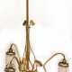 Jugendstil-Deckenlampe, um 1900, Messing, 3 geschwungene Lampenarme mit Blatt- und Ornamentaldekor, mit Prismen- und röhrenförmigem Glasbehang, H. ca. 90 cm, dazu diverse Glasersatzteile - photo 1