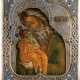 AN ICON SHOWING ST. SIMEON THE GOD-RECEIVER WITH A SILVER-GILT AND CLOISONNÉ ENAMEL RIZA - Foto 1