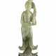 A serpentine model of a lady wearing long robes, with wood base - Foto 1