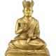 A Tibetan-Chinese gilt bronze figure of Lama - фото 1
