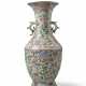 A large Famille Rose celadon ground moulded vase with dragon, flowers, and birds decoration - фото 1