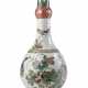A Famille Verte porcelain vase with flower, butterfly and birds decorations - photo 1