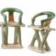 A pair of sancai glazed models of horseshoe chairs - photo 1