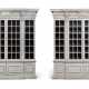 A PAIR OF 'KENTIAN' WHITE-PAINTED BREAKFRONT BOOKCASES - фото 1