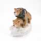 PORCELAIN FIGURINE OF A CROUCHING PAIR OF LIONS - photo 1