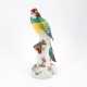 LARGE PORCELAIN PARROT SITTING ON TREE TRUNK WITH CHERRY - Foto 1