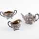 THREE PIECE SILVER GEORGE IV TEA SERVICE WITH FLORAL RELIEF DECOR - photo 1