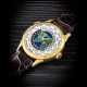 PATEK PHILIPPE. AN 18K GOLD AUTOMATIC WORLD TIME WRISTWATCH WITH CLOISONN&#201; ENAMEL DIAL - photo 1